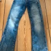 Ausgewaschene flared Jeans