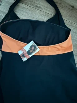 Badekleid in schwarz-orange mit Mesh