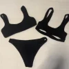 Bikini schwarz mit 2 Oberteilen