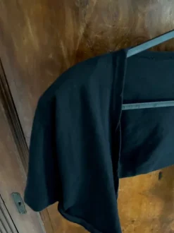 Black bolero with shoulder pads