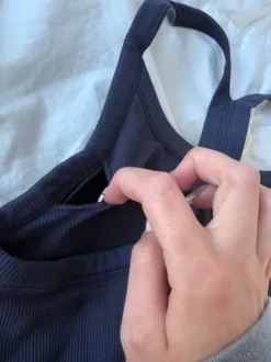 dark blue sports bra thick straps structured pretty back removable pads