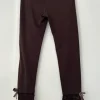dunkelbraune Leggings mit Spitze und Schleifen