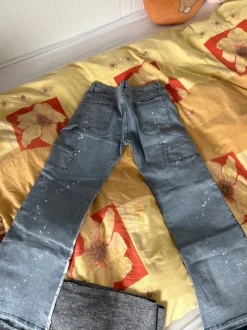 Flared Jeans mit Prints Größe M