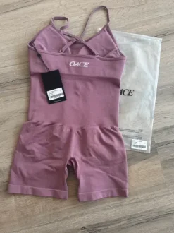 Oace Toned Active Onesie Gr. S Dark Rose