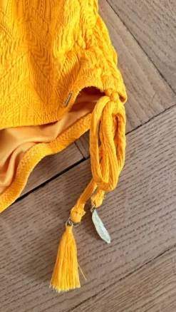 Piha Badeanzug / Body in Orange mit Strukturmuster – Gr. 38/M