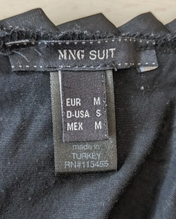 Ärmellose Bluse mit Volantkragen
