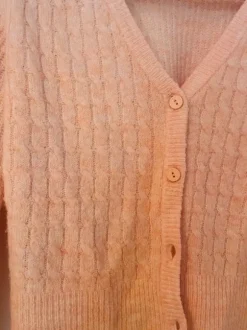 Rosa Strickjacke