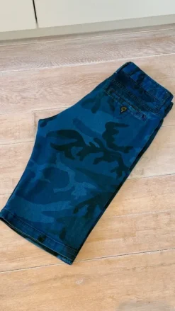Short homme WE – taille 31 – motif camouflage bleu – excellent état
