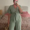 Superbe combinaison verte avec noue manche courte fluide