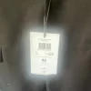 Zwarte blazer nooit gedragen met prijskaartje