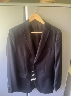 Zwarte blazer nooit gedragen met prijskaartje